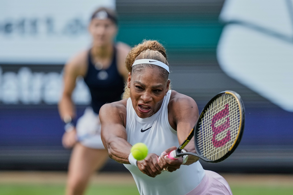Serena Williams of the U.S. returns the ball as she and Czech Republic's Karolina Muchova play during their round of 16 doubles match against New Zealand's Erin Routliffe and Mexico's Giuliana Olmo during the WTA 500 Berlin Open tennis tournament at Steffi Graf Stadium, in Berlin, Germany, Tuesday, June 16, 2026. (AP Photo/Ebrahim Noroozi)