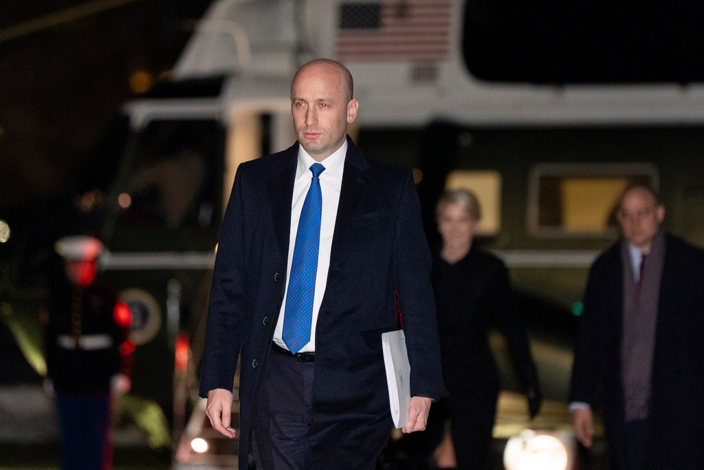 White House deputy chief of policy Stephen Miller walks from Marine One after arriving on the South Lawn of the White House, Tuesday, Jan. 27, 2026, in Washington. (AP Photo/Alex Brandon)