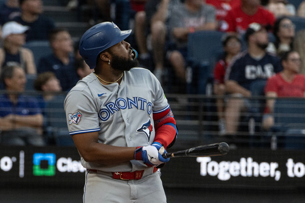 Toronto Blue Jays' Vladimir Guerrero Jr. watches his three-run home run off Cleveland Guardians starting pitcher Joey Cantillo during the second inning of a baseball game, Wednesday, Sept. 2, 2026, in Cleveland. (AP Photo/Phil Long)