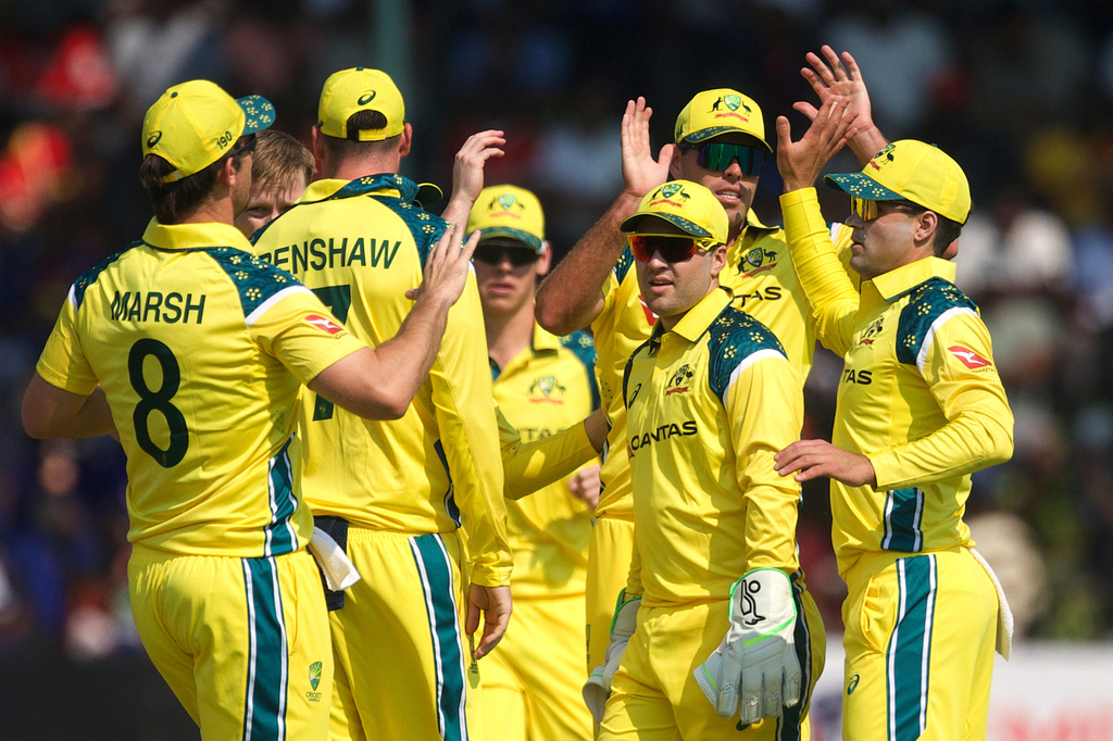 Australia players celebrate a wicket during the first One Day International cricket match between Zimbabwe and Australia in Harare, Zimbabwe, Tuesday, Sept.15, 2026. (AP Photo/Wonder Mashura)