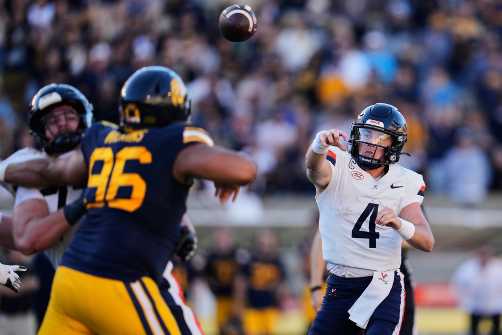 Virginia quarterback Chandler Morris (4) passes the ball during the second half of an NCAA college football game against California, Saturday, Nov. 1, 2025, in Berkeley, Calif. (AP Photo/Godofredo A. V&aacute;squez)