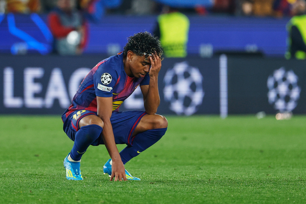 Barcelona's Lamine Yamal reacts disappointed after the Champions League quarterfinal first leg soccer match between Barcelona and Atletico Madrid in Barcelona, Spain, Wednesday, April 8, 2026. (AP Photo/Joan Monfort)