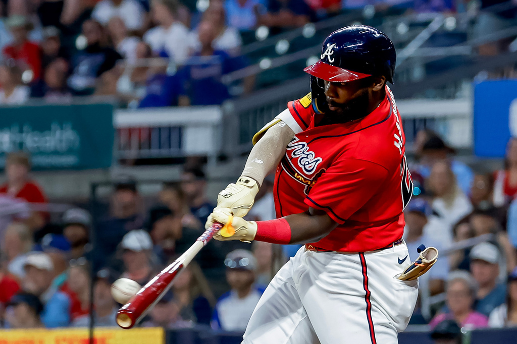 Atlanta Braves' Michael Harris II hits a three-run home run against the Washington Nationals during the sixth inning of a baseball game, Friday, July 31, 2026, in Atlanta. (AP Photo/Erik S. Lesser)