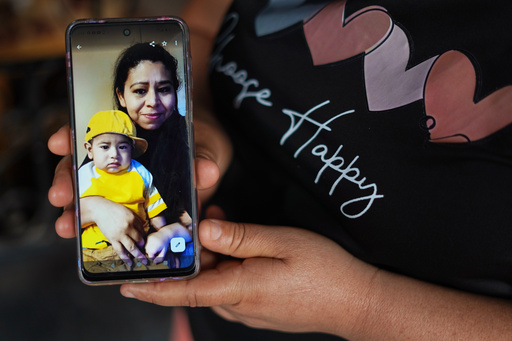 Carmen Gavidia Ramírez shows a portrait of her sister Maribel Ramírez and her nephew Evan, who died in a traffic accident in Jackson County, Georgia, at her home in Tepetitan, El Salvador, Wednesday, Oct. 15, 2025. (AP Photo/Salvador Melendez) Carmen Gavidia Ramírez shows a portrait of her sister Maribel Ramírez and her nephew Evan, who died in a traffic accident in Jackson County, Georgia, at her home in Tepetitan, El Salvador, Wednesday, Oct. 15, 2025. (AP Photo/Salvador Melendez)