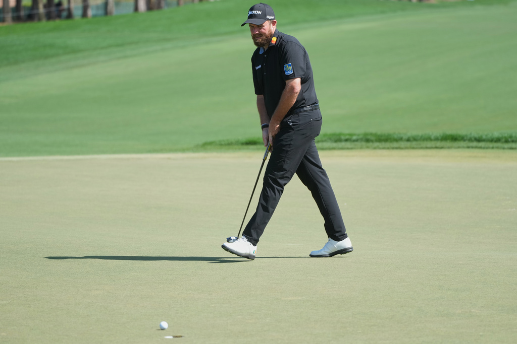 Shane Lowry of Ireland reacts to a missed putt on the second hole during the final round of the Cognizant Classic golf tournament, Sunday, March 1, 2026, in Palm Beach Gardens, Fla. (AP Photo/Marta Lavandier)