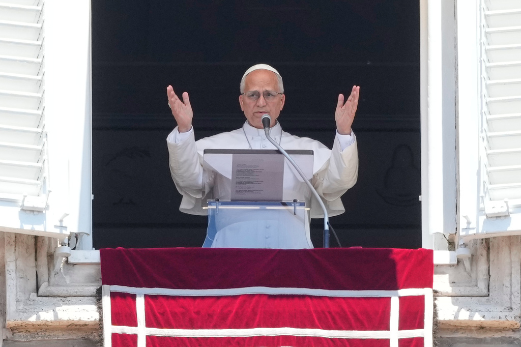 Pope Leo XIV delivers the Angelus noon prayer in St. Peter's Square, at the Vatican, Sunday, May 31, 2026. (AP Photo/Gregorio Borgia)