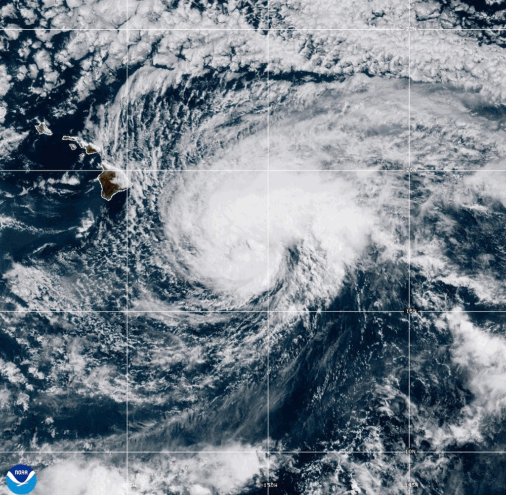 This NOAA satellite image taken at 5:22 p.m. EST on Friday, Aug. 14, 2026, shows Tropical Storm Lala as it approaches Hawaii's Big Island. (NOAA via AP)
