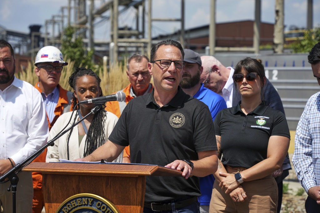 Pennsylvania Governor Josh Shapiro talks with media at the Clairton Coke Works, a U.S. Steel plant, in Clairton, Pa., Tuesday, Aug. 12, 2025. (AP Photo/Gene J. Puskar)