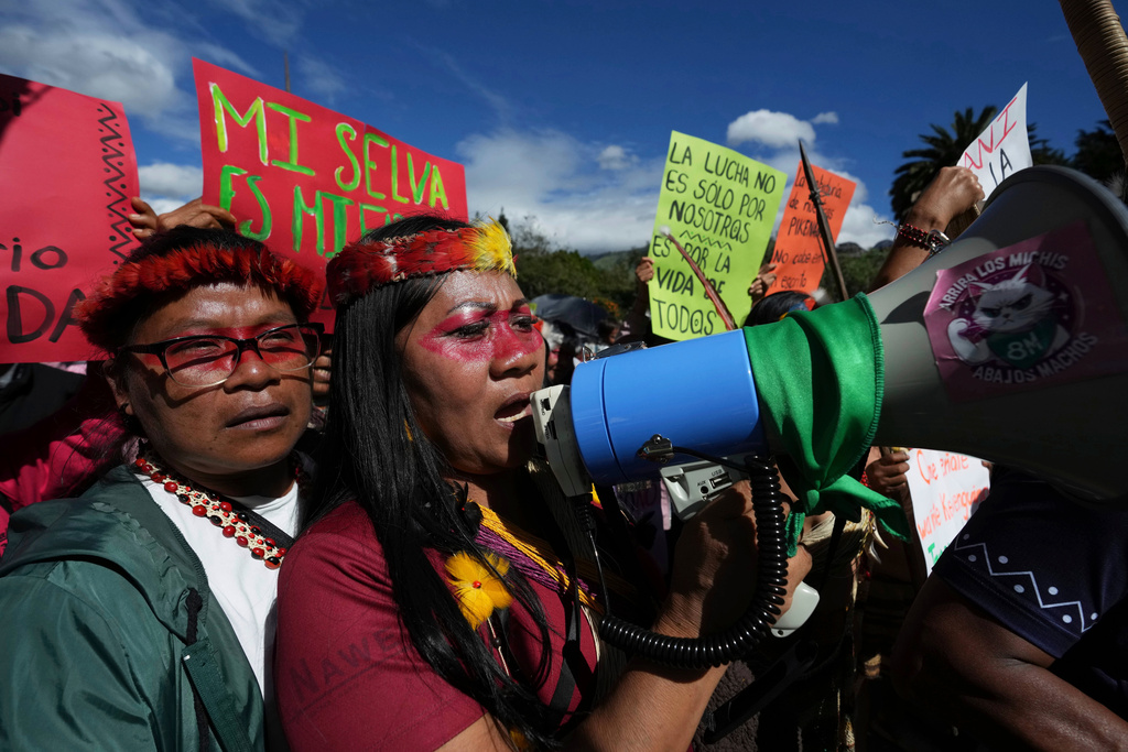 FILE - Waorani Indigenous people march to the Constitutional Court to protest for their right to consultation before the bidding for the exploration and exploitation of oil and gas on their territory in Quito, Ecuador, May 13, 2025. (AP Photo/Dolores Ochoa, File)
