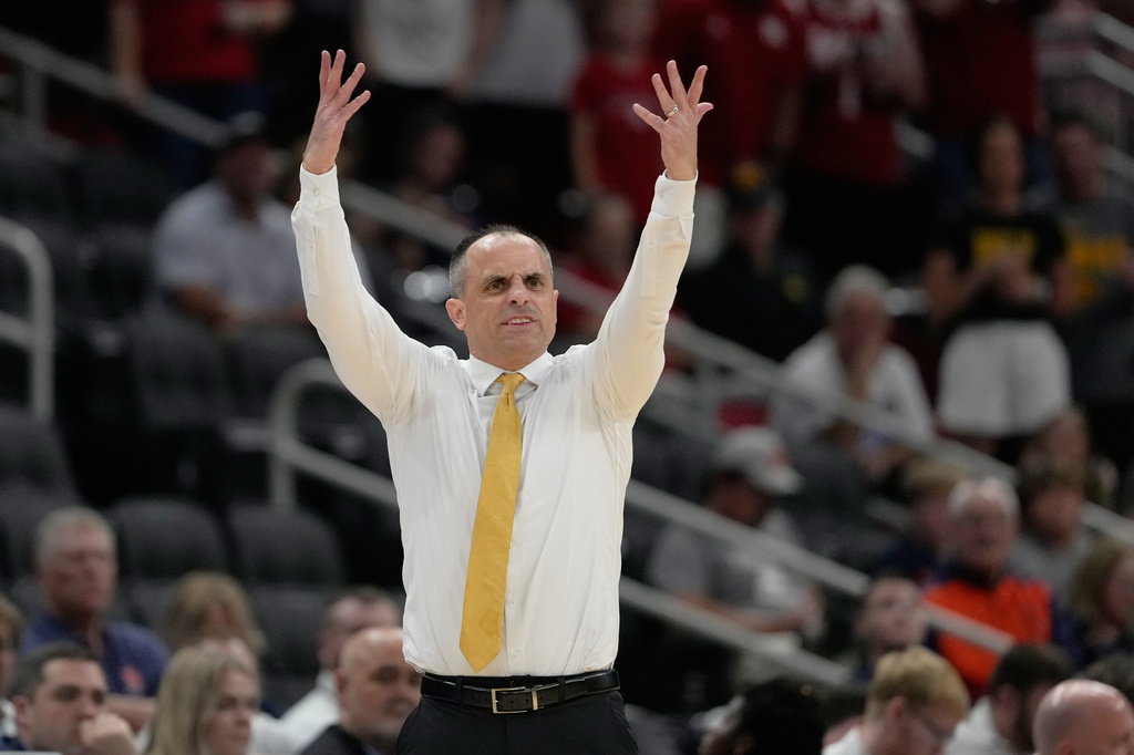 Iowa head coach Ben McCollum directs his team during the first half against Nebraska in the Sweet 16 of the NCAA college basketball tournament Thursday, March 26, 2026, in Houston. (AP Photo/Ashley Landis)
