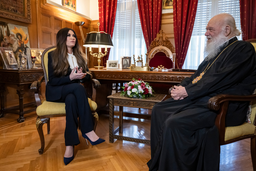 Kimberly Guilfoyle, U.S. Ambassador to Greece, left, meets the Archbishop of Athens and leader of Greece's Orthodox Church, Ieronymos II in Athens, Thursday, Nov 13, 2025. (Aris Messinis/ Pool Photo via AP)