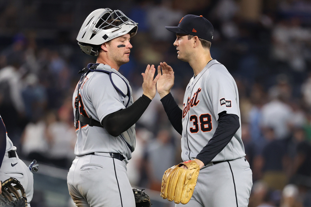 Detroit Tigers' Dillon Dingler, left, and Drew Anderson, right, react after defeating the New York Yankees in a baseball game Monday, June 29, 2026, in New York. (AP Photo/Pamela Smith)