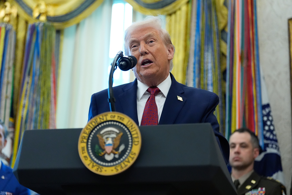 President Donald Trump speaks during a Mexican Border Defense Medal presentation in the Oval Office of the White House, Monday, Dec. 15, 2025, in Washington. (AP Photo/Alex Brandon)
