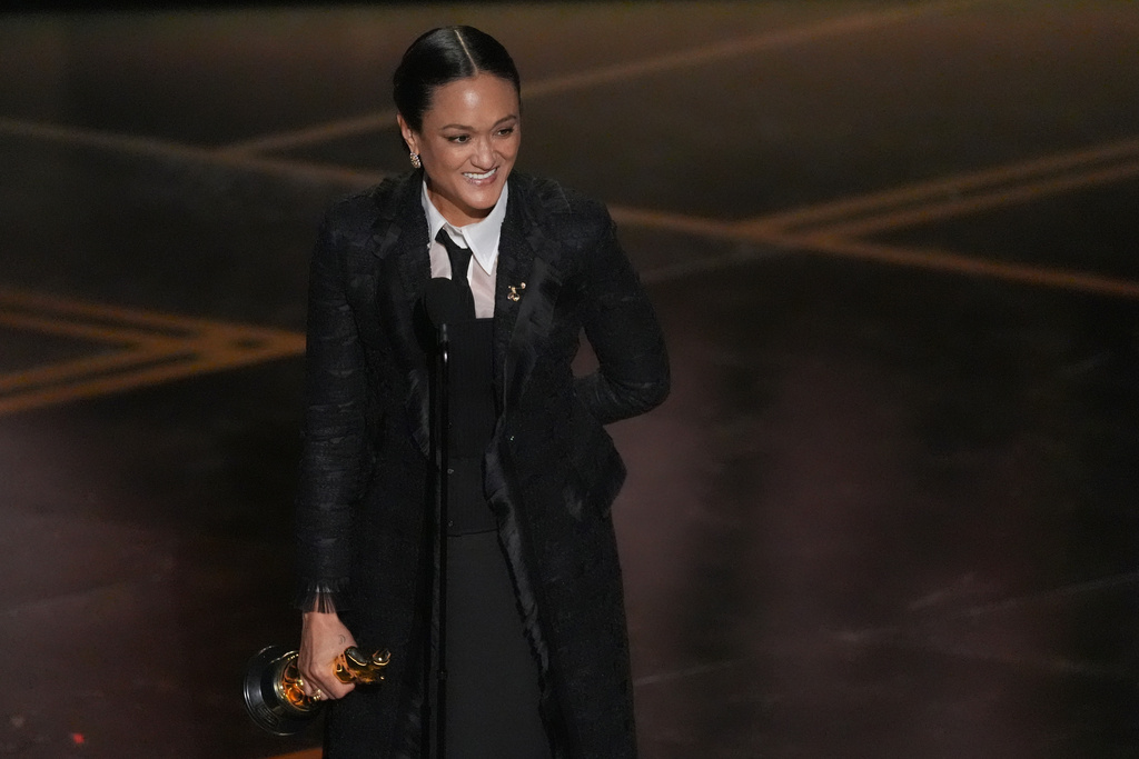 Autumn Durald Arkapaw accepts the award for cinematography for "Sinners" during the Oscars on Sunday, March 15, 2026, at the Dolby Theatre in Los Angeles. (AP Photo/Chris Pizzello)