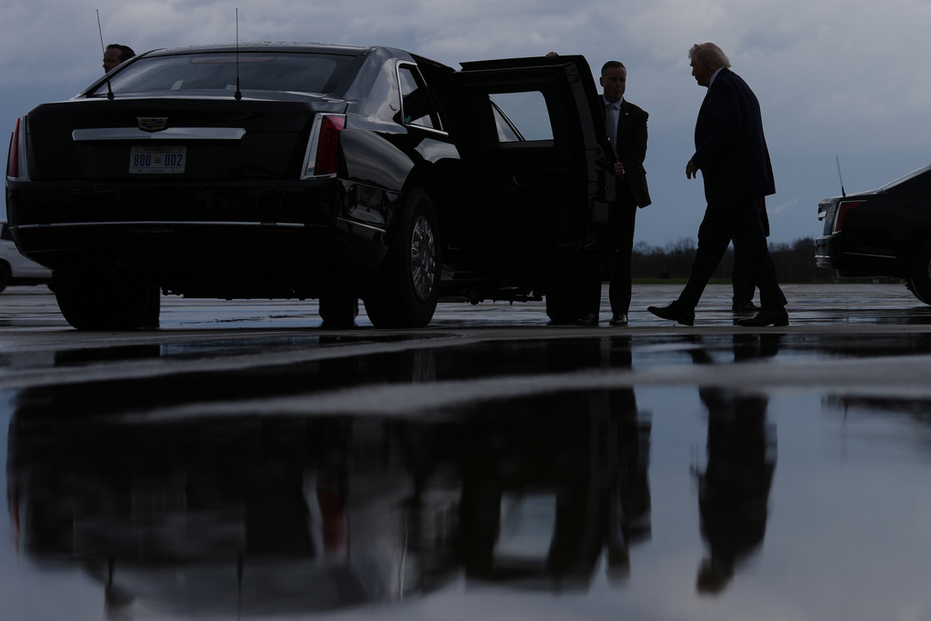 President Donald Trump walks to his vehicle after arriving on Air Force One at Cincinnati/Northern Kentucky International Airport, Wednesday, March 11, 2026, in Hebron, Ky. (AP Photo/Julia Demaree Nikhinson)