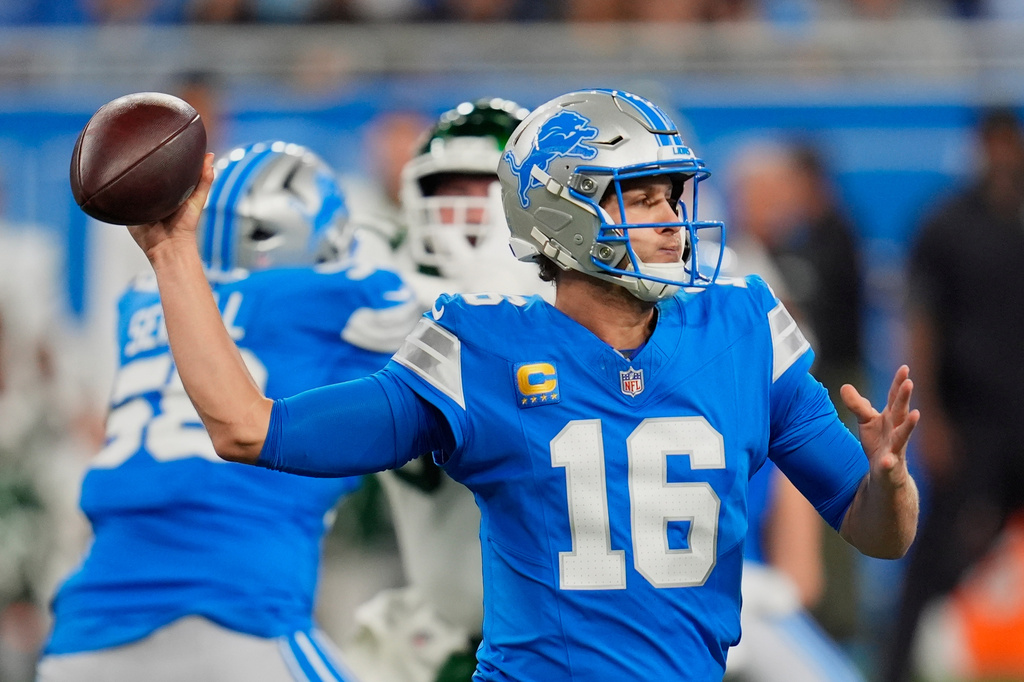 Detroit Lions' Jared Goff throws during the first half of an NFL football game against the New York Jets in Detroit, Sunday, Sept. 27, 2026. (AP Photo/Paul Sancya)