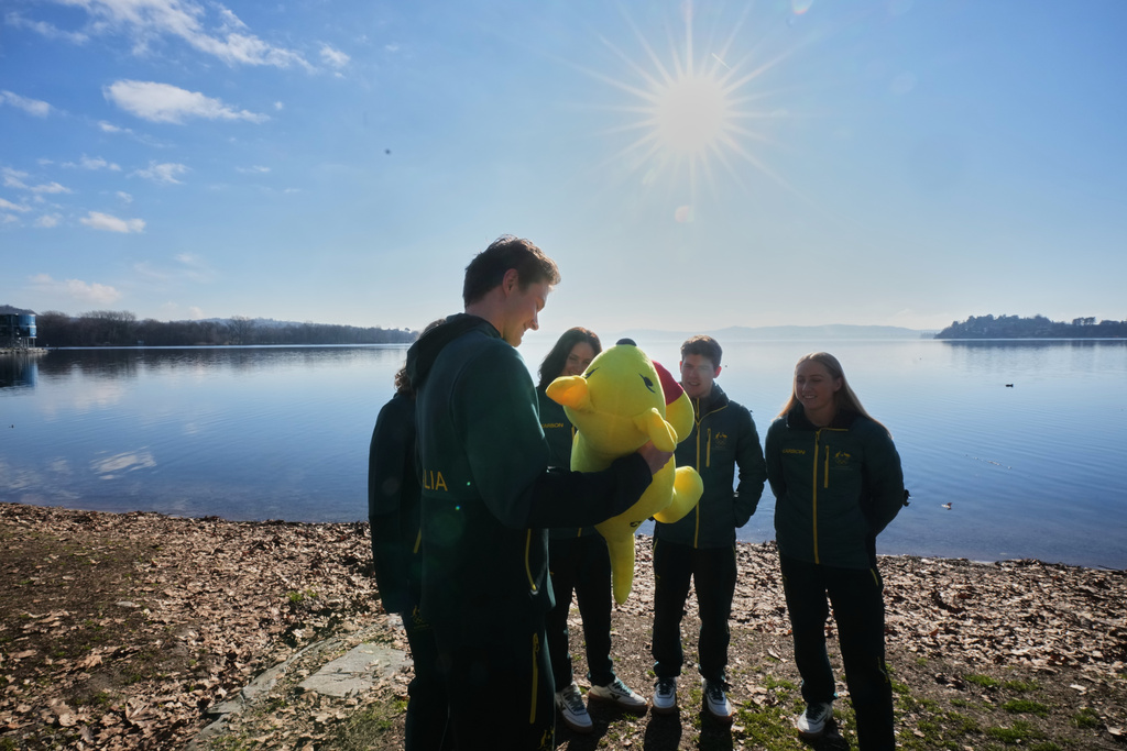 Australia's Winter Olympics team athletes stand at the AIS European Training Centre in Gavirate, on the Varese lake, northern Italy, Monday, Jan. 26, 2026. (AP Photo/Antonio Calanni)