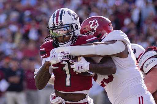 South Carolina running back Rahsul Faison (1) gets tackled in the backfield by Alabama defensive lineman James Smith (23) during the first half of an NCAA college football game, Saturday, Oct. 25, 2025, in Columbia, S.C. (AP Photo/Scott Kinser) South Carolina running back Rahsul Faison (1) gets tackled in the backfield by Alabama defensive lineman James Smith (23) during the first half of an NCAA college football game, Saturday, Oct. 25, 2025, in Columbia, S.C. (AP Photo/Scott Kinser)