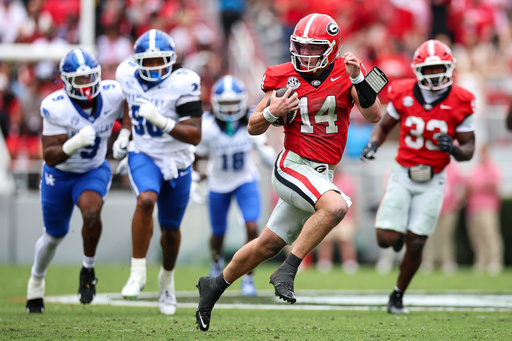 Georgia quarterback Gunner Stockton (14) runs with the ball during the first half of an NCAA college football game against Kentucky, Saturday, Oct. 4, 2025, in Athens, Ga. (AP Photo/Colin Hubbard) Georgia quarterback Gunner Stockton (14) runs with the ball during the first half of an NCAA college football game against Kentucky, Saturday, Oct. 4, 2025, in Athens, Ga. (AP Photo/Colin Hubbard)