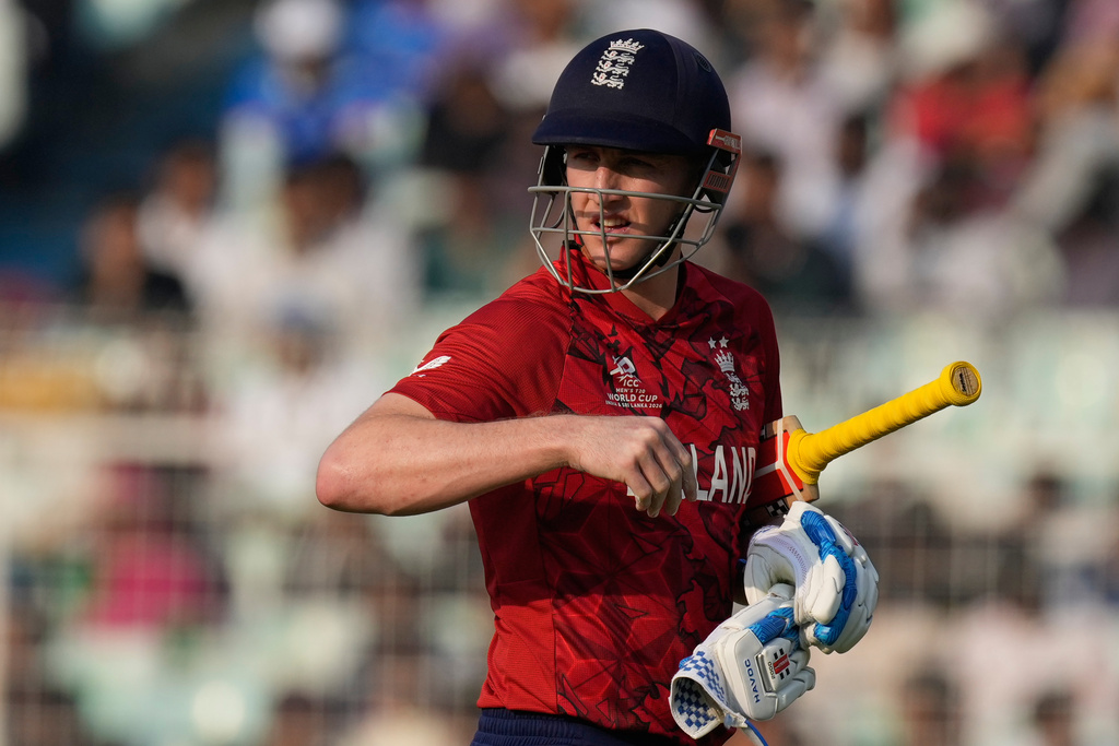 England's captain Harry Brook leaves the ground after losing his wicket during the T20 World Cup cricket match between England and Italy in Kolkata, India, Monday, Feb. 16, 2026. (AP Photo/Bikas Das)