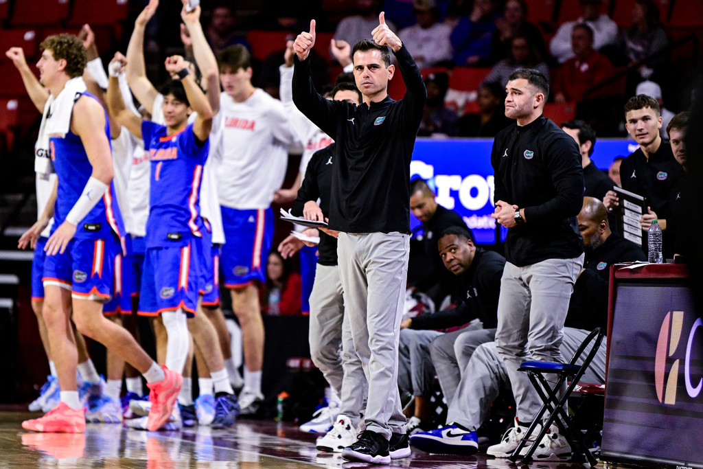 Florida head coach Todd Golden gestures towards referee during the second half of an NCAA college basketball game against Oklahoma, Tuesday, Jan. 13, 2026, in Norman, Okla. (AP Photo/Gerald Leong)