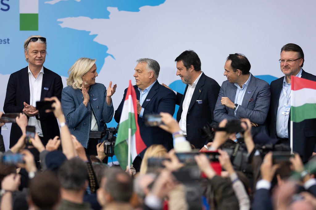 Hungarian Prime Minister Viktor Orbán, third from left, stands with, from left; Geert Wilders of the Netherlands, France's Marine Le Pen, Italy's Matteo Salvini, Belgium's Tom Van Grieken and Latvia's Ainārs Šlesers during an assembly of European far-right parties with Orbán’s Patriots for Europe group, in Budapest, Hungary, Monday, March 23, 2026. (AP Photo/Denes Erdos)