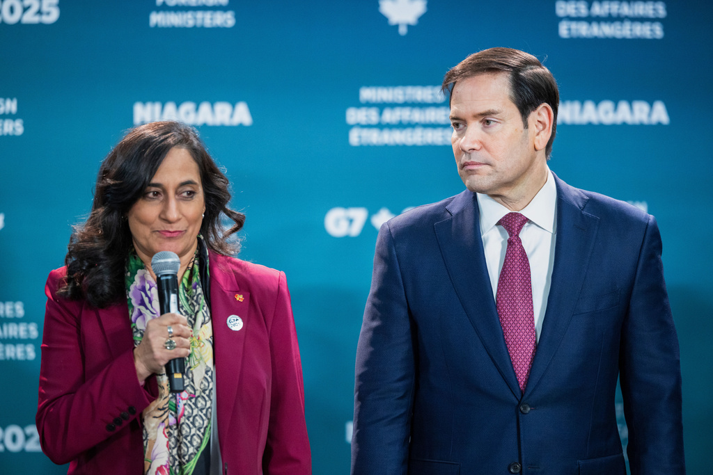 U.S. Secretary of State Marco Rubio, right, stands beside Canada's Minister of Foreign Affairs Anita Anand, as she speaks ahead of the family photo during the G7 Foreign Ministers' Meeting in Niagara-on-the-Lake, Ontario, on Tuesday, Nov. 11, 2025. (Nick Iwanyshyn/The Canadian Press via AP)
