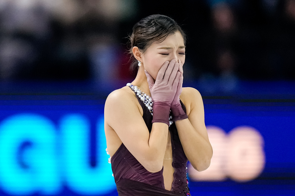 Kaori Sakamoto from Japan reacts at the end of her routine during the women free skating at the Figure Skating World Championships in Prague, Czech Republic, Friday, March 27, 2026. (AP Photo/Petr David Josek)