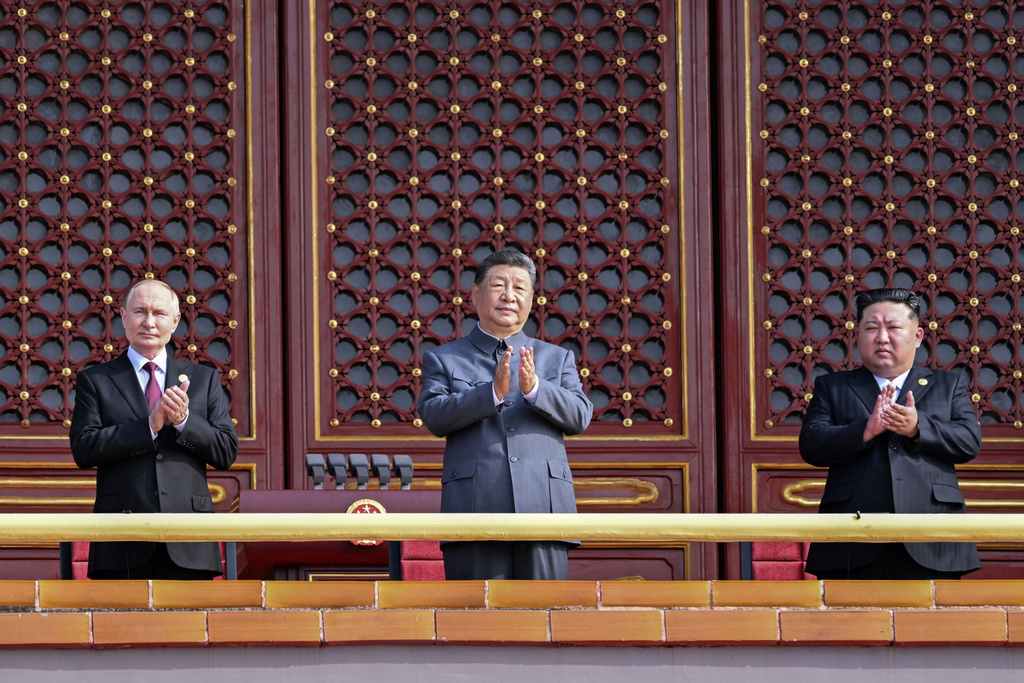 In this photo provided by the North Korean government, from right, North Korean leader Kim Jong Un, Chinese President Xi Jinping and Russian President Vladimir Putin attend a military parade marking the 80th anniversary of the end of World War II at Tiananmen Square in Beijing Wednesday, Sept. 3, 2025. The content of this image is as provided and cannot be independently verified. (Korean Central News Agency/Korea News Service via AP)