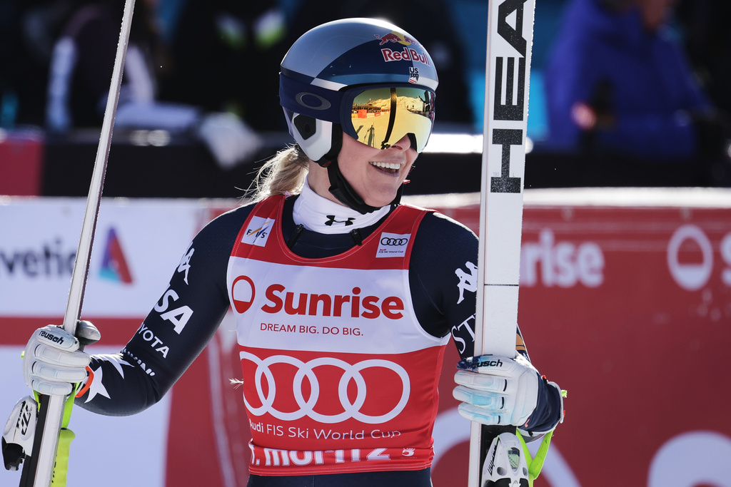 United States' Lindsey Vonn reacts in the finish area after completing an alpine ski, women's World Cup downhill, in St. Moritz, Switzerland, Saturday Dec. 13, 2025. (AP Photo/Luciano Bisi)