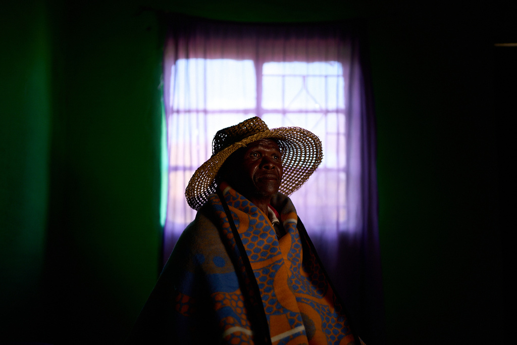 Moeketsi Moleme, 65, who is HIV-positive, poses for a portrait in Ha Koloboi, Lesotho, Saturday, July 12, 2025. Before Moleme contracted the virus, he admits, he discriminated against his HIV-positive neighbors. Then, he got infected, too, and joined them in their peer support group. A former miner, Moleme discovered he was HIV-positive after falling seriously ill with tuberculosis. He is now doing much better, in part thanks to U.S.-funded health programs. "The government in Lesotho and the government in the U.S. must find a solution," he said. (AP Photo/Bram Janssen)