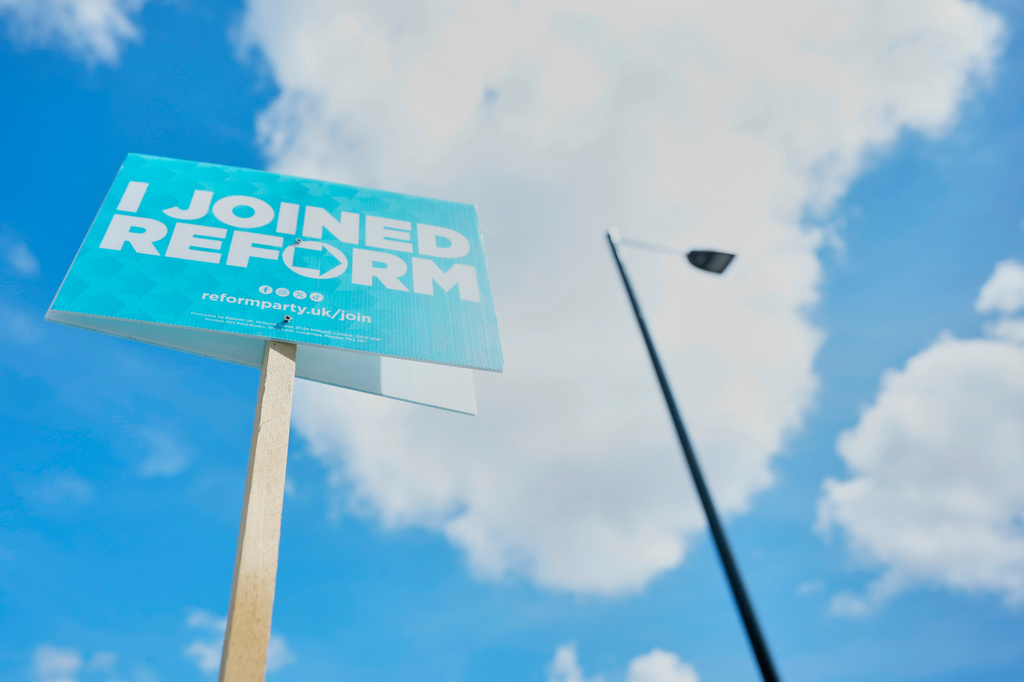 A Reform UK political sign put up by the householder to show support ahead of local council elections in London, Wednesday, May 6, 2026. (AP Photo/Alastair Grant)