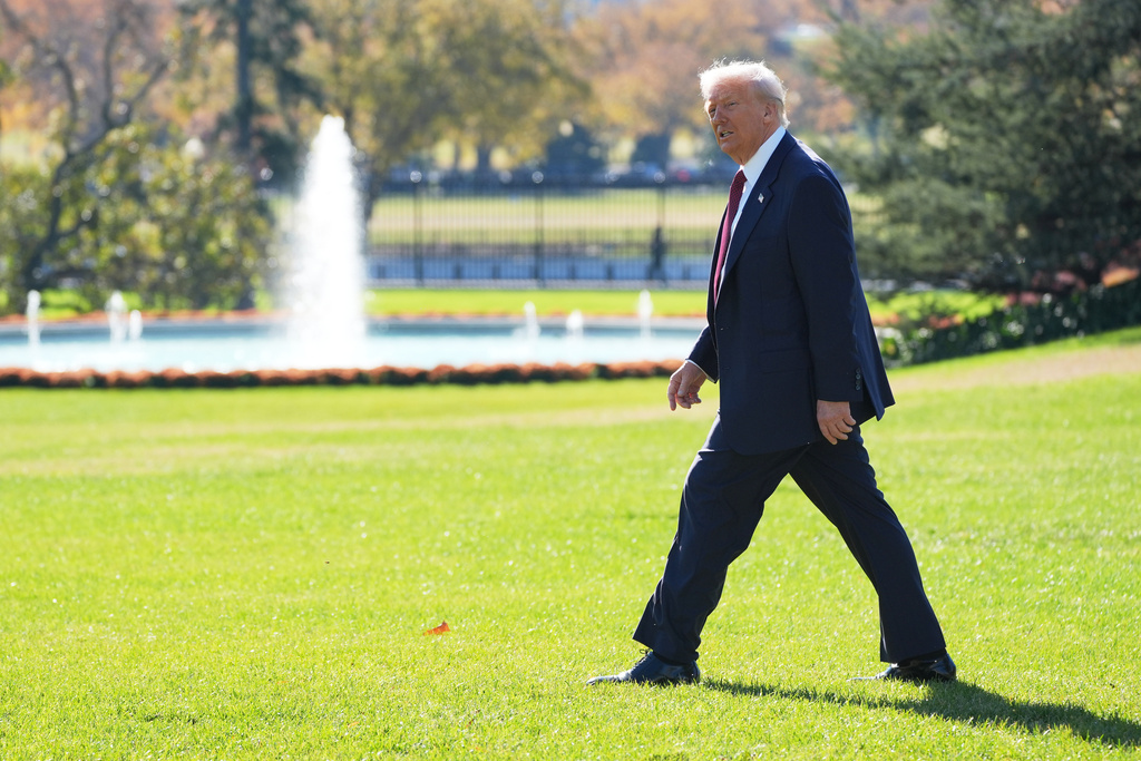 President Donald Trump walks out to board Marine One on the South Lawn of the White House, Wednesday, Nov. 5, 2025, in Washington. (AP Photo/Evan Vucci)