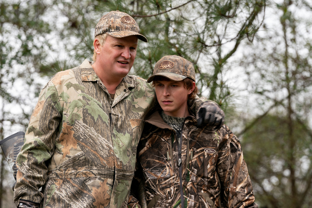 This image released by Hulu shows Jason Clarke, left, and Johnny Berchtold in a scene from the limited series "Murdaugh: Death in the Family." (Daniel Delgado Jr./Hulu via AP)