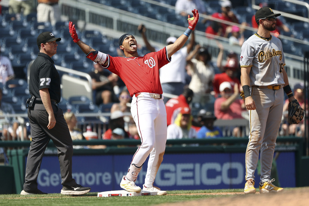Washington Nationals' Daylen Lile celebrates after hitting a an RBI double and advancing to third during the eighth inning of a baseball game against the Pittsburgh Pirates, Sunday, Sept. 14, 2025, in Washington. (AP Photo/Daniel Kucin Jr.)