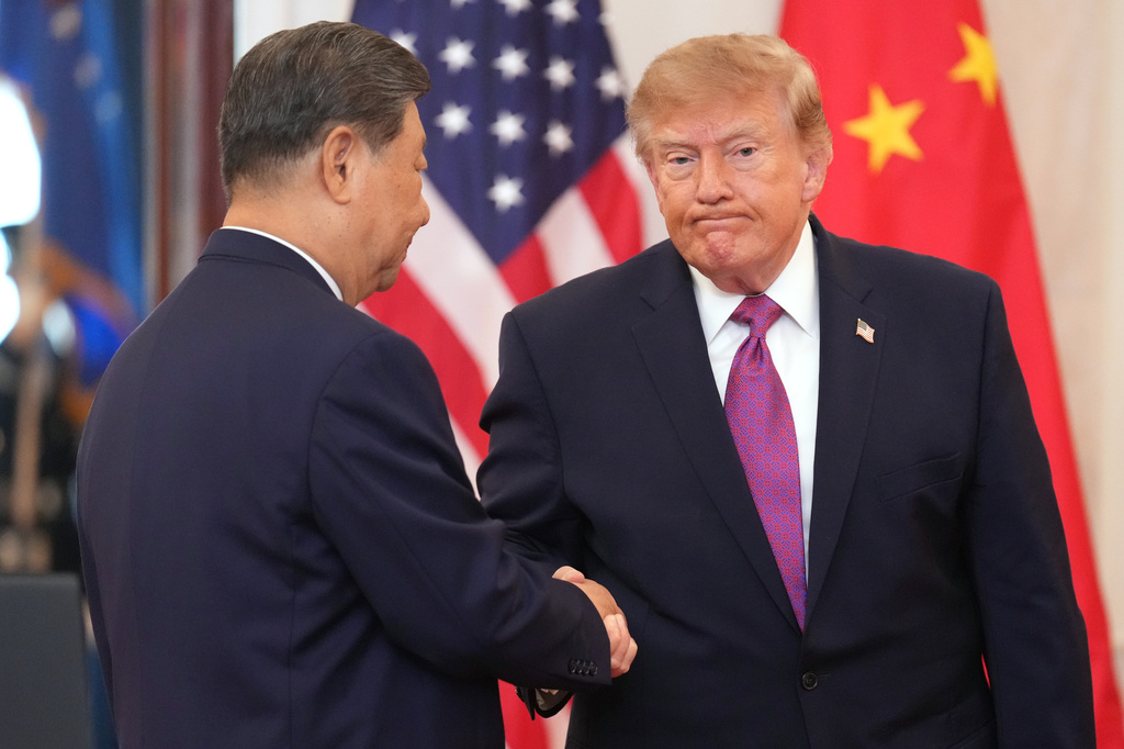 President Donald Trump shakes hands with China's President Xi Jinping during an arrival ceremony in the Grand Foyer of the White House, Thursday, Sept. 24, 2026, in Washington. (AP Photo/Jacquelyn Martin)