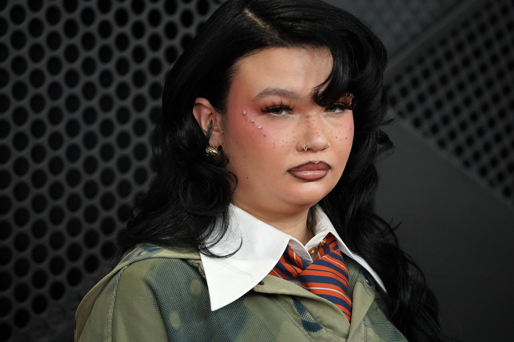 Lola Young arrives at the 68th annual Grammy Awards on Sunday, Feb. 1, 2026, in Los Angeles. (Photo by Jordan Strauss/Invision/AP)