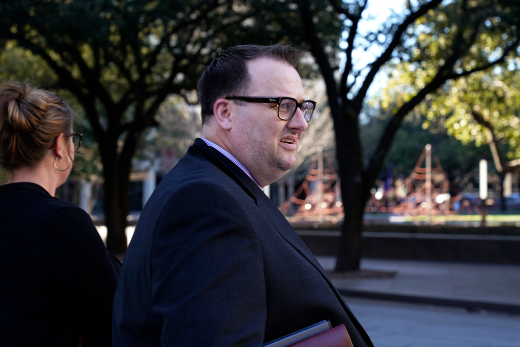 FILE - Former Los Angeles Angels employee Eric Kay waits to cross the street after exiting federal court Feb. 15, 2022, in Fort Worth, Texas, where he is on trial for federal drug distribution and conspiracy charges. (AP Photo/LM Otero, File)