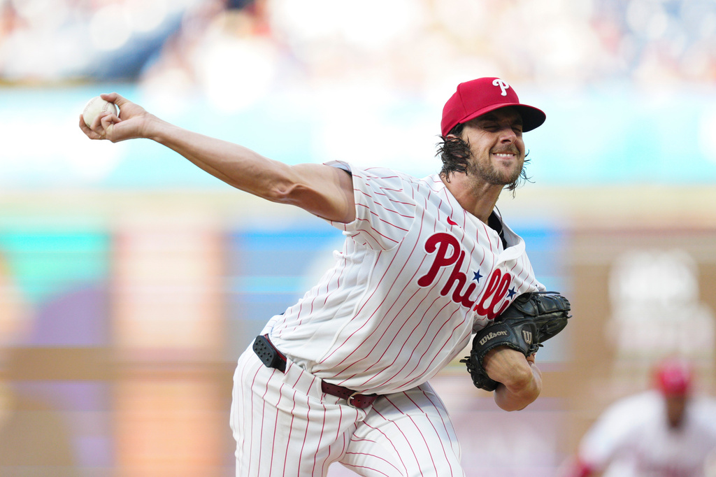 Philadelphia Phillies pitcher Aaron Nola throws during the first inning of a baseball game against the Miami Marlins, Wednesday, Aug. 19, 2026, in Philadelphia. (AP Photo/Derik Hamilton)