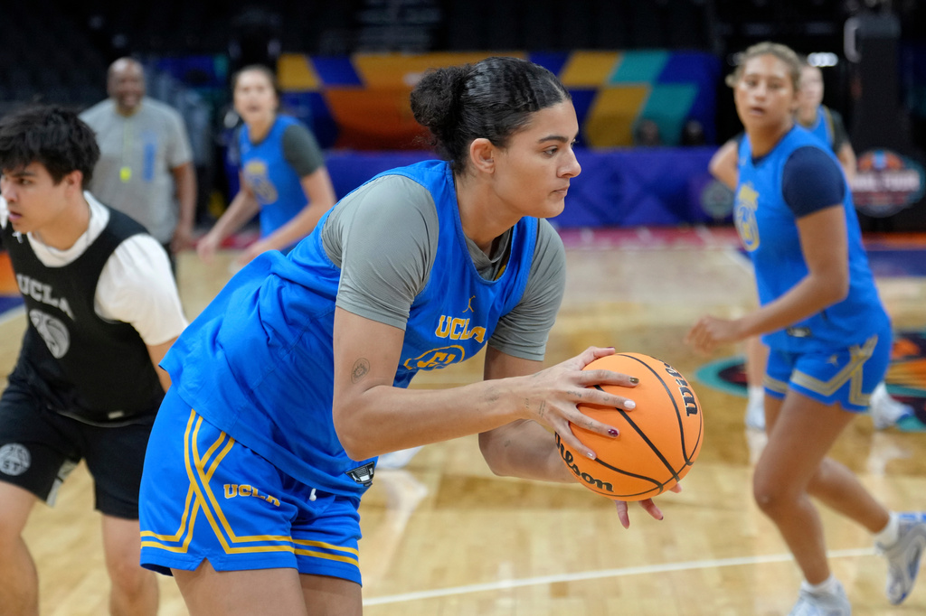 UCLA center Lauren Betts catches a pass during practice prior to the national semifinals at the Women's Final Four of the NCAA college basketball tournament, Thursday, April 2, 2026, in Phoenix. (AP Photo/Ross D. Franklin)