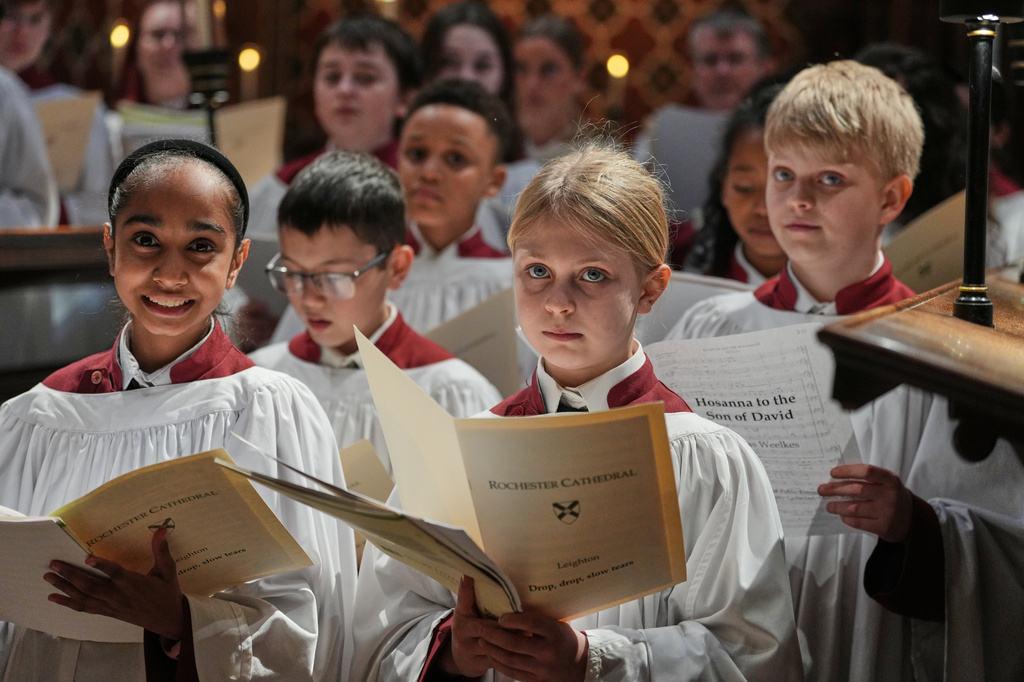 Britain Choral Music Choristers sing during Evensong at Rochester Cathedral in Rochester, England, Friday, March 27, 2026. (AP Photo/Kin Cheung)