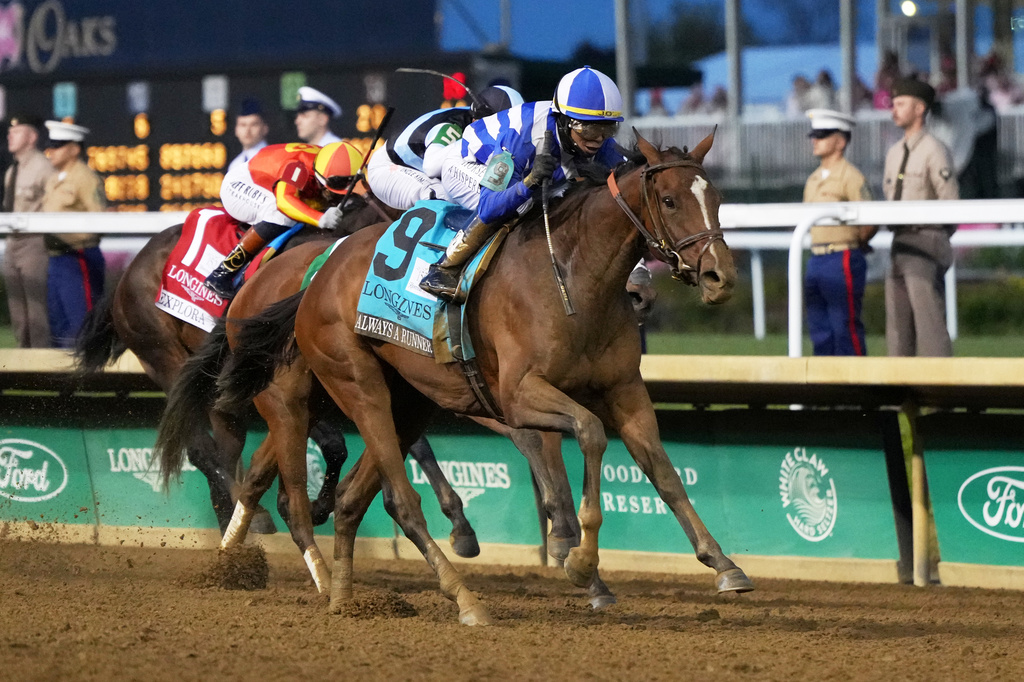 Always a Runner (9) ridden by Jose L. Ortiz wins the 152nd running of the Kentucky Oaks horse race at Churchill Downs, Friday, May 1, 2026, in Louisville, Ky. (AP Photo/Jeff Roberson)