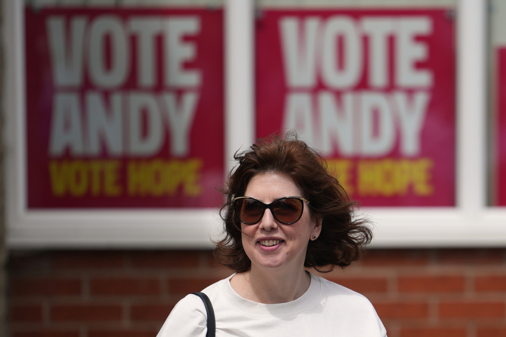 Labour's deputy leader Lucy Powell walks past the headquarters during the by-election in Makerfield, England, Thursday, June 18, 2026 where voters are choosing a new lawmaker with Andy Burnham of the Labour Party as the leading contender.(AP Photo/Jon Super)