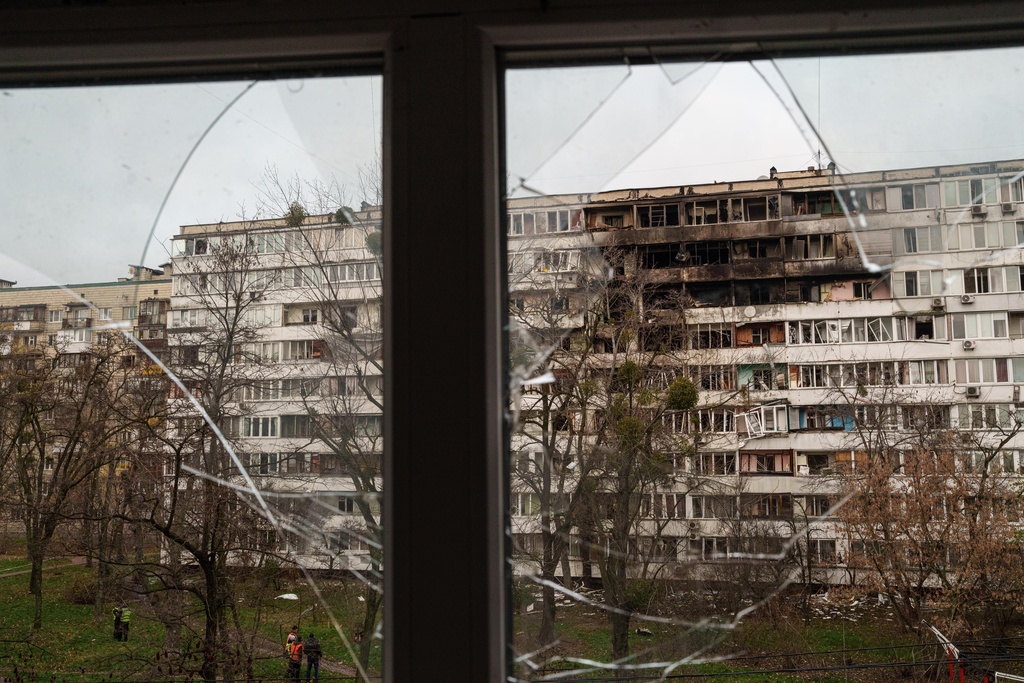 A residential building is seen heavily damaged after a Russian strike on Kyiv, Ukraine, on Tuesday, Nov. 25, 2025. (AP Photo/Evgeniy Maloletka)