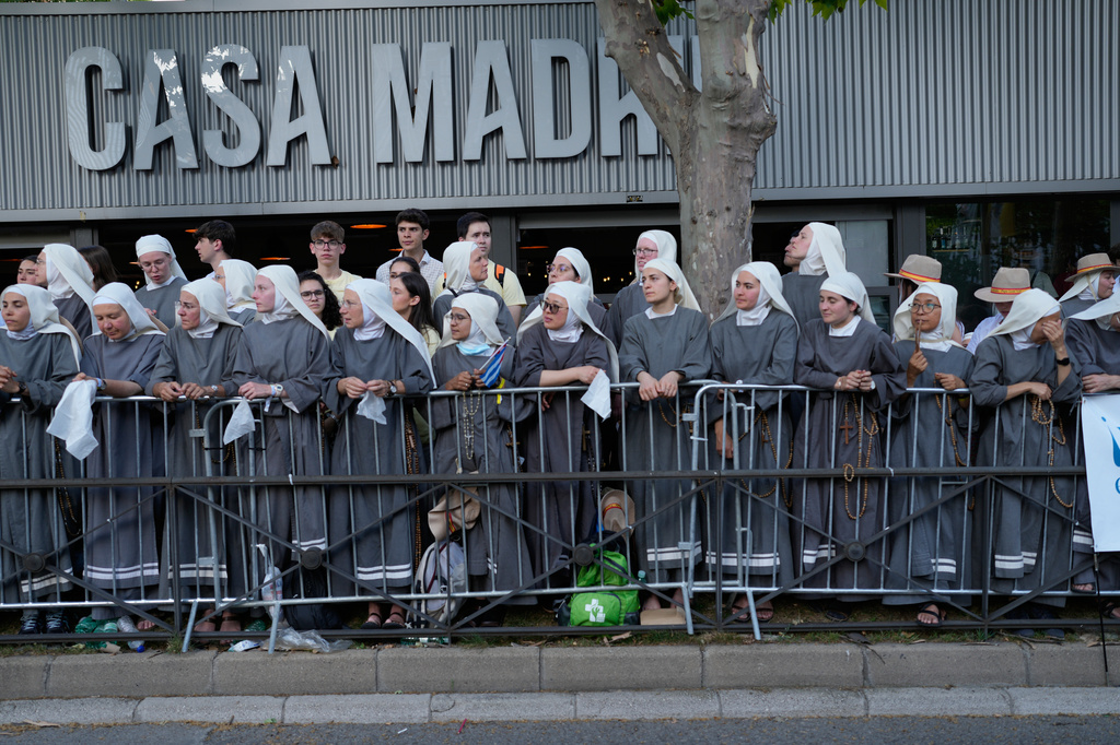 A group of nuns wait for the arrival of Pope Leo XIV during a prayer vigil with young people at Plaza de Lima in Madrid, Spain, Saturday, June 6, 2026, on the first day of his seven-day apostolic visit to mainland Spain and the Canary Islands. (AP Photo/Bernat Armangue)