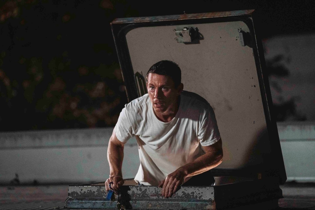This image released by Paramount Pictures shows Channing Tatum in a scene from "Roofman." (Davi Russo/Paramount Pictures via AP)