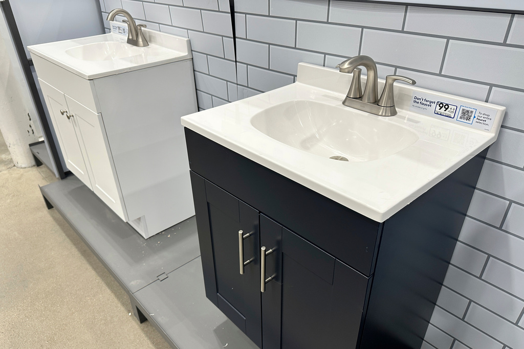 Bathroom vanities sit on display at a hardware store Friday, Sept. 26, 2025, in Nashville, Tenn. (AP Photo/George Walker IV)