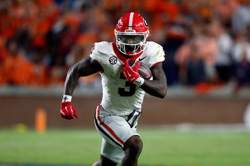 Georgia running back Nate Frazier carries the ball against Auburn during the second half of an NCAA college football game, Saturday, Oct. 11, 2025, in Auburn, Ala. (AP Photo/Butch Dill) Georgia running back Nate Frazier carries the ball against Auburn during the second half of an NCAA college football game, Saturday, Oct. 11, 2025, in Auburn, Ala. (AP Photo/Butch Dill)