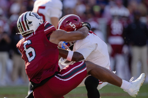 South Carolina defensive end Dylan Stewart (6) tackles Alabama wide receiver Germie Bernard (5) for a loss during the first half of an NCAA college football game, Saturday, Oct. 25, 2025, in Columbia, S.C. (AP Photo/Scott Kinser) South Carolina defensive end Dylan Stewart (6) tackles Alabama wide receiver Germie Bernard (5) for a loss during the first half of an NCAA college football game, Saturday, Oct. 25, 2025, in Columbia, S.C. (AP Photo/Scott Kinser)