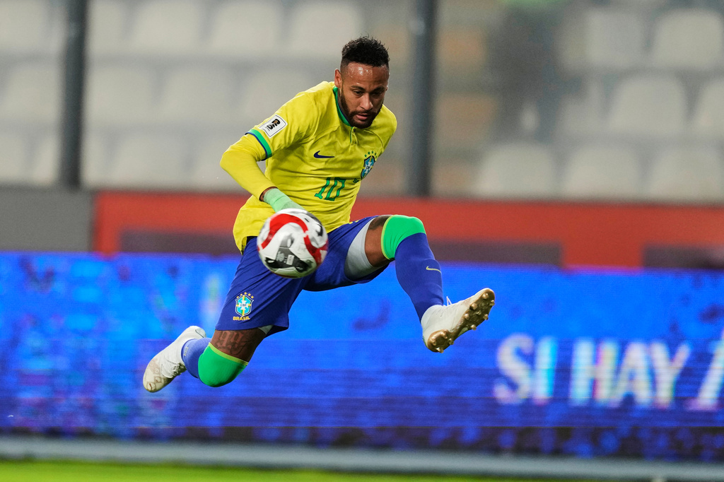 FILE- Brazil's Neymar controls the ball during a World Cup qualifying soccer match against Peru at National stadium in Lima, Peru, Tuesday, Sept. 12, 2023. (AP Photo/Martin Mejia, File)